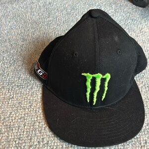 Monster adjustable cap. Black with green embroidery.